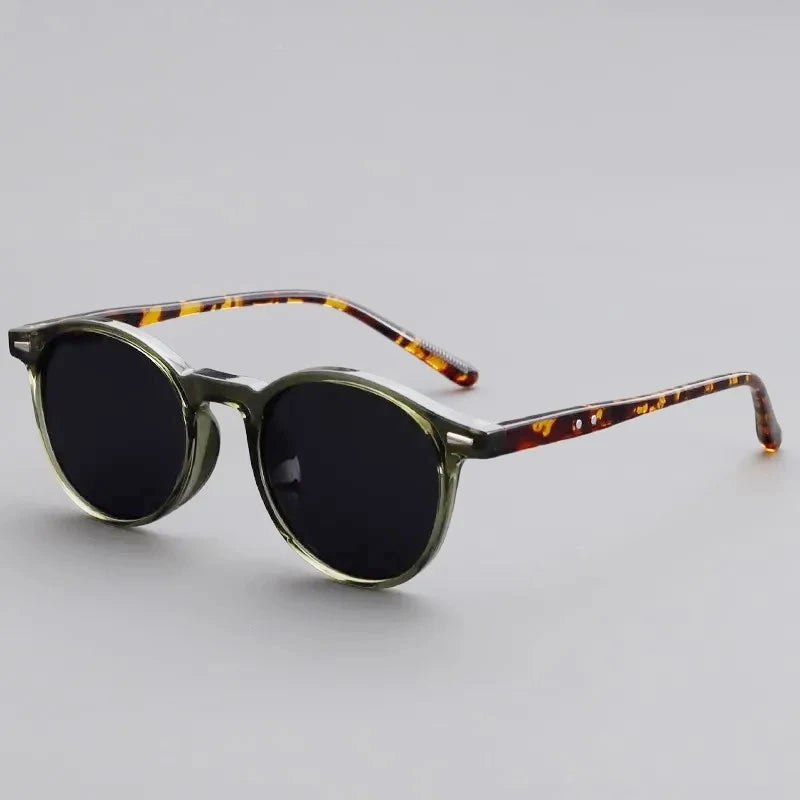 Vintage round sunglasses with tortoiseshell frames and dark lenses