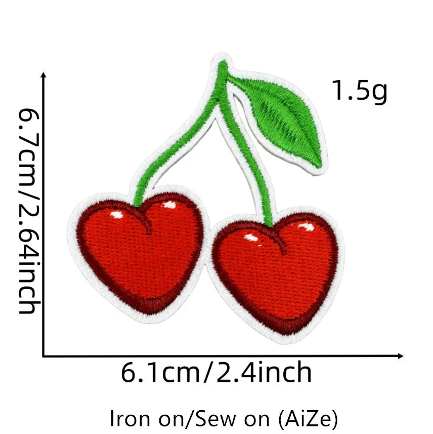 A pair of red cherry embroidered iron-on patches measuring 6.7cm long and 2.64 inches wide.