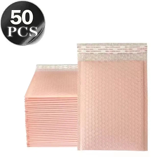 A stack of 50 pink opaque bubble mailers with self-sealing adhesive.