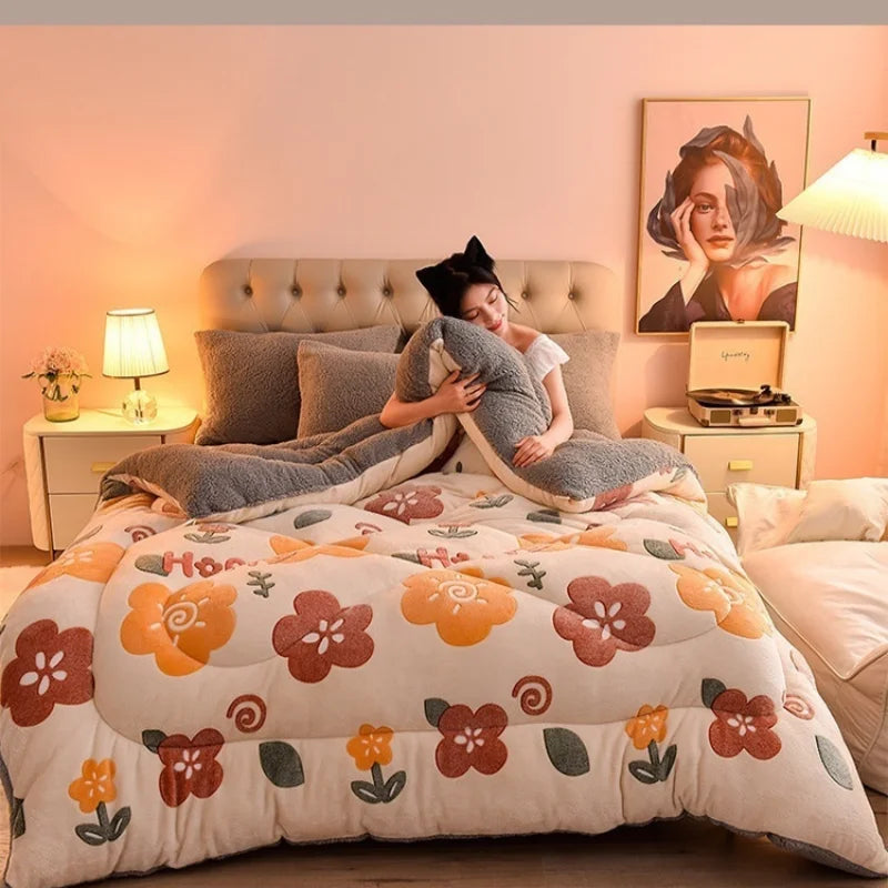 A cozy double-sided velvet warm quilt blanket is displayed on a bed with soft lighting.