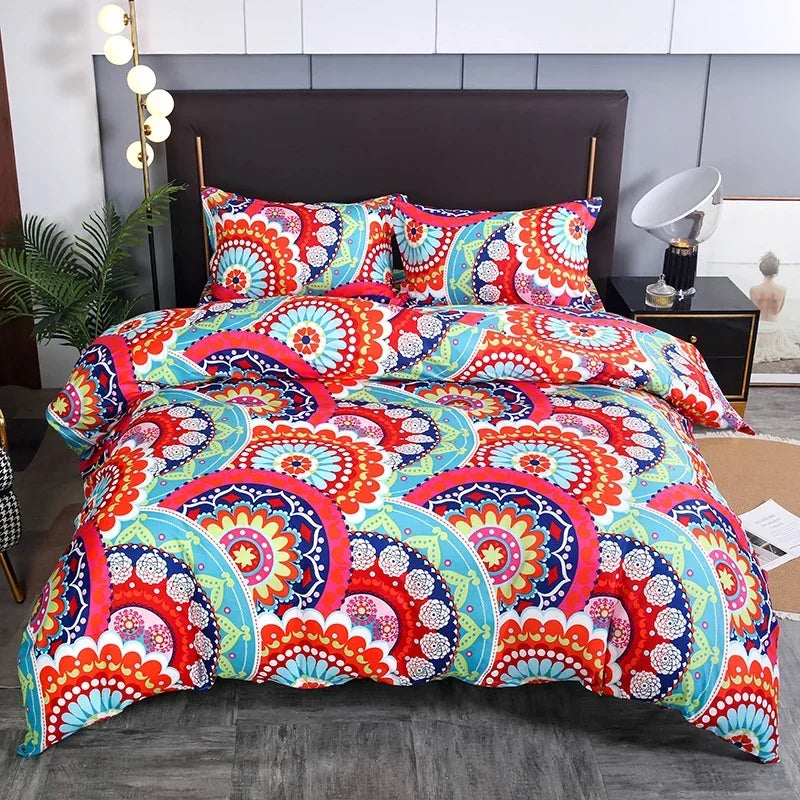A vibrant floral and geometric patterned duvet cover set with matching pillowcases displayed on a bed.