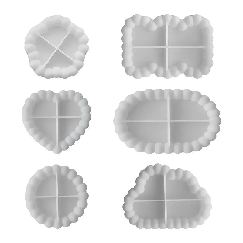 A set of five silicone tray molds for crafting resin, gypsum, and clay with decorative edges.