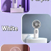 A white mini USB rechargeable handheld fan with a circular grille is shown on a light-colored stand.