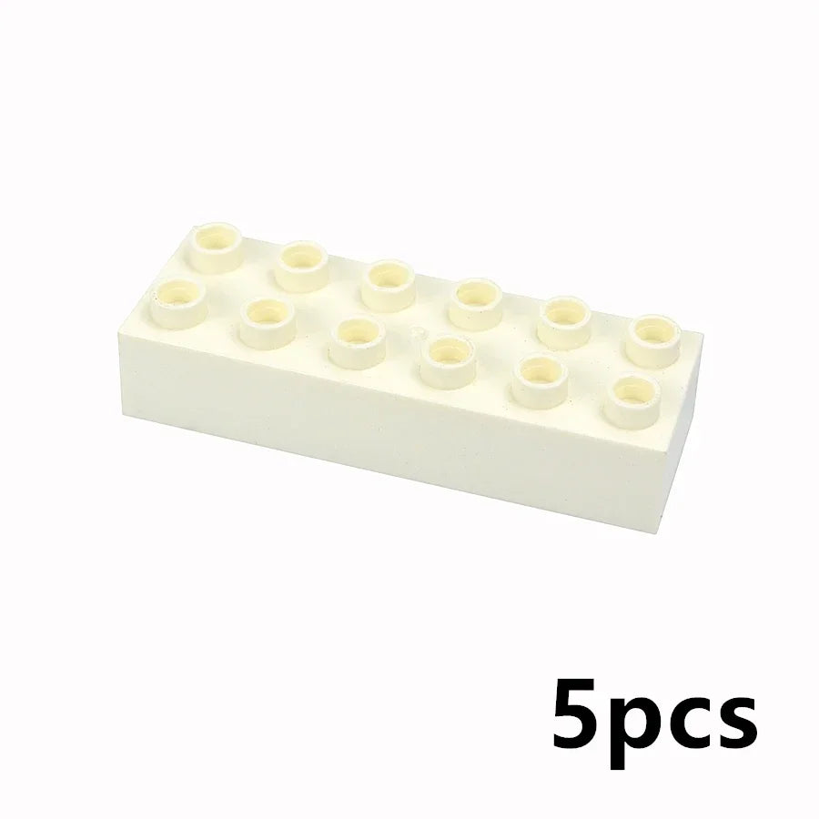 A white rectangular block containing five small, round white building blocks.