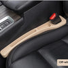 A beige gap plug strip is shown in a black car seat interior, designed to stop items from slipping between seats.