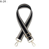 Black and white patterned adjustable crossbody bag strap with gold hardware