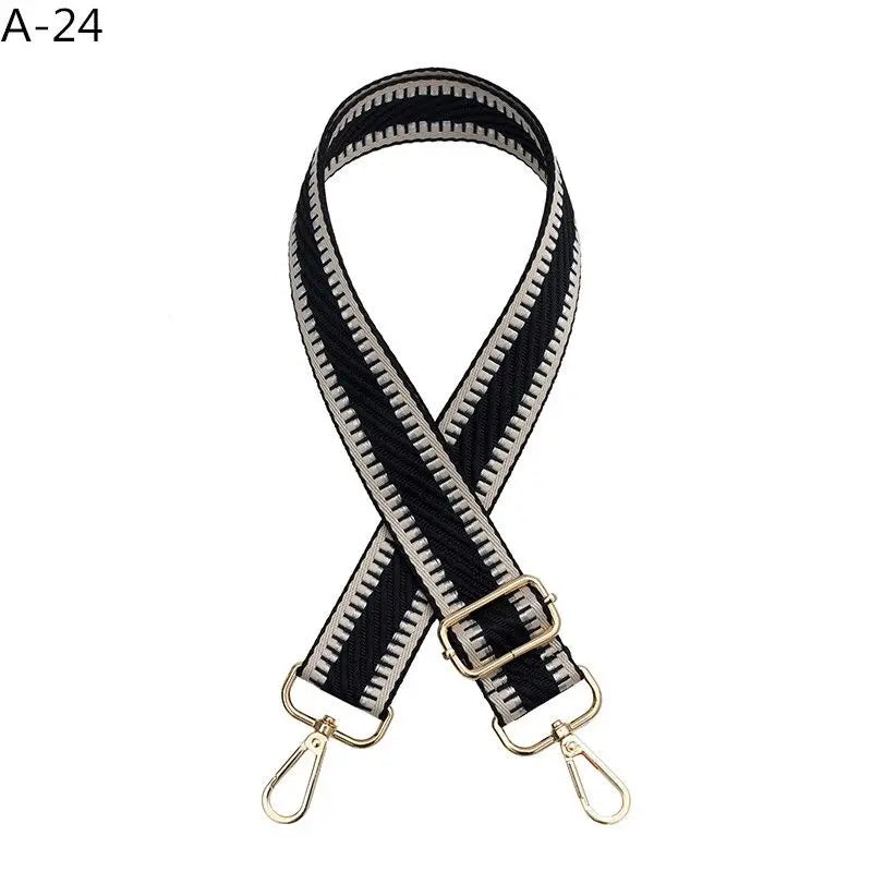 Black and white patterned adjustable crossbody bag strap with gold hardware
