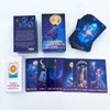 A set of Celestial Tarot decks including a box, a guidebook, and several individual cards showing celestial imagery.