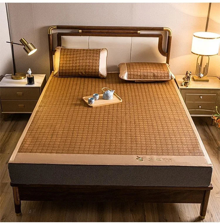 A wooden bed frame with a padded mat and pillow, featuring a cooling surface and decorative elements.