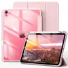 A pink slim tri-fold stand case for an iPad with a pencil holder and a tablet displaying a sunset landscape.