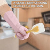 A hand wearing a pink rubber glove is holding a yellow dishwashing sponge, demonstrating a stable grip.