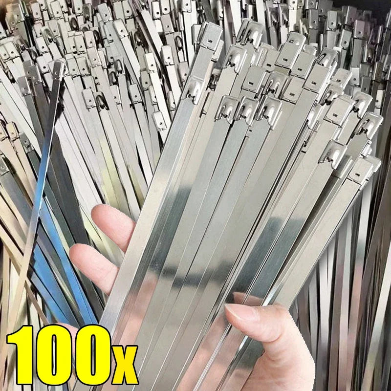 A hand holds a bundle of reusable self-locking stainless steel cable ties.