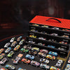 A collection of 48 diecast metal car models in various colors and finishes displayed on a black surface.