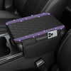 A black diamond quilted car armrest cover with purple glowing accents and a phone storage slot.