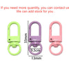 Three colorful alloy lobster clasp hooks in lime green, purple, and pink with various sizes