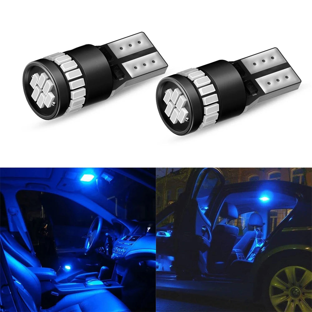 A pair of Canbus Error-Free T10 LED bulbs for replacement, shown in close-up and installed in a car interior.