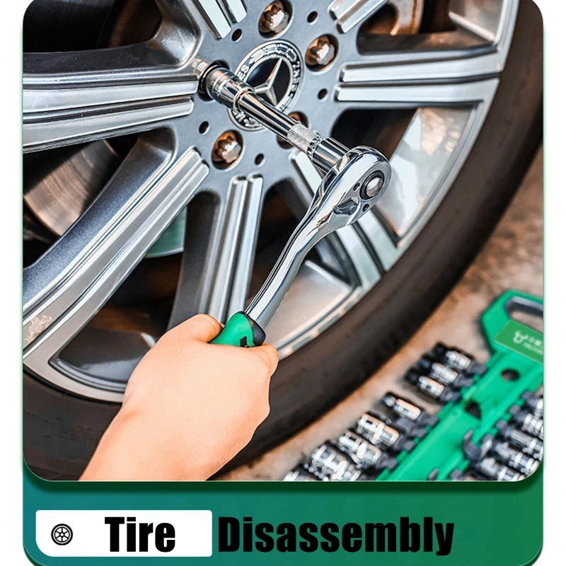 A hand uses a chrome vanadium socket set with a quick-release ratchet to disassemble a car tire wheel.