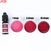 A set of concentrated liquid candle dyes in various shades of red and pink, shown with 1, 5, and 10 drops.