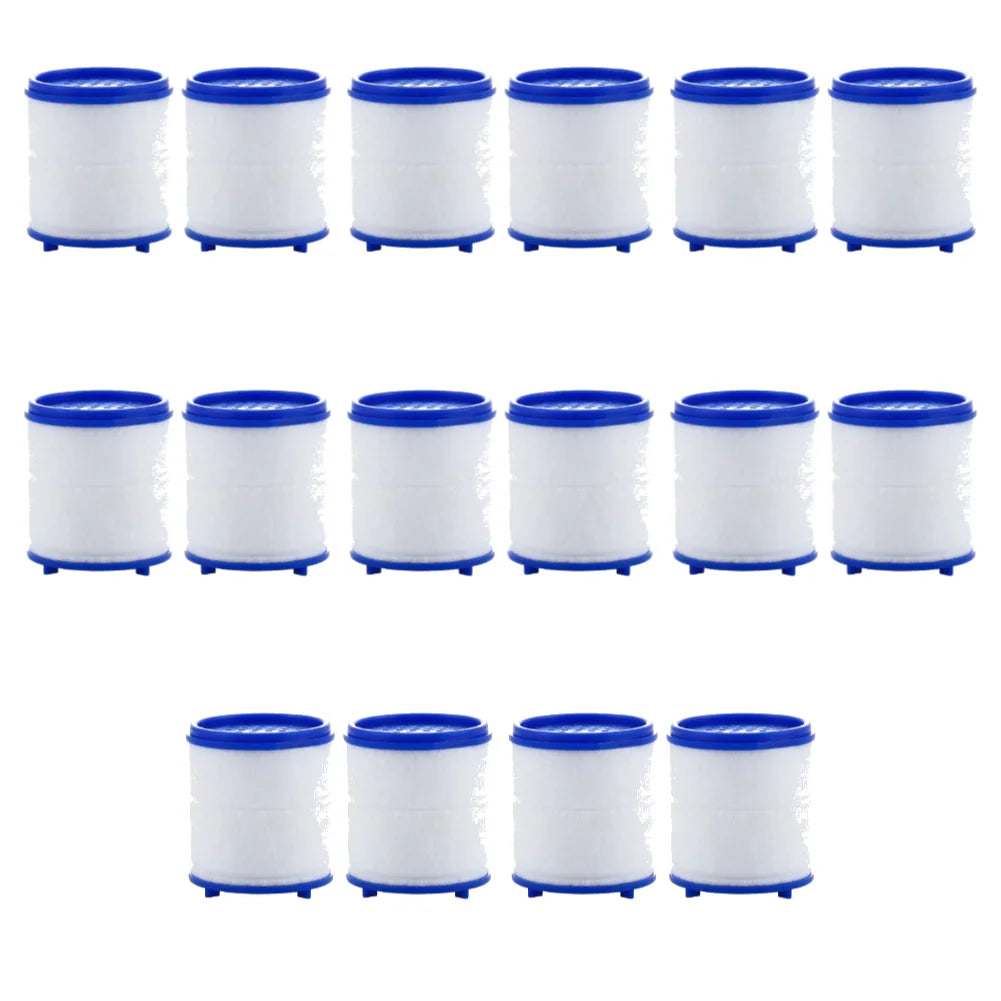 A set of twelve white kitchen faucet water filters with blue caps and splash guards arranged in a grid.