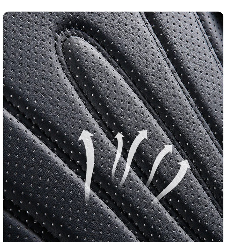 Close-up view of black full coverage PU leather car seat covers with visible stitching and texture.