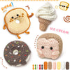 A collection of crochet crafts including a bread donut, ice cream cone, and a hedgehog figure.
