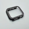 Carcasa de borde con lentejuelas negras para Apple Watch, mostrada sobre fondo blanco.