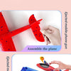 Hands assemble a red foam plane model and attach it to a blue toy boat.