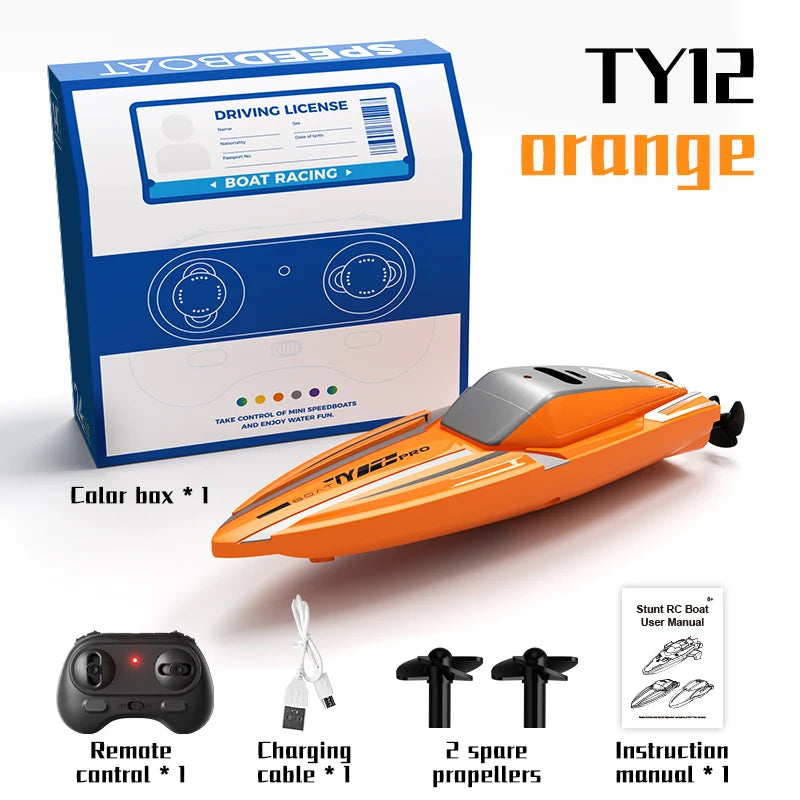 Orange TY12 racing speedboat kit including a box, remote control, charging cable, and two propellers.