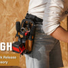 A person is holding a small tool pouch with a quick-release belt clip accessory.