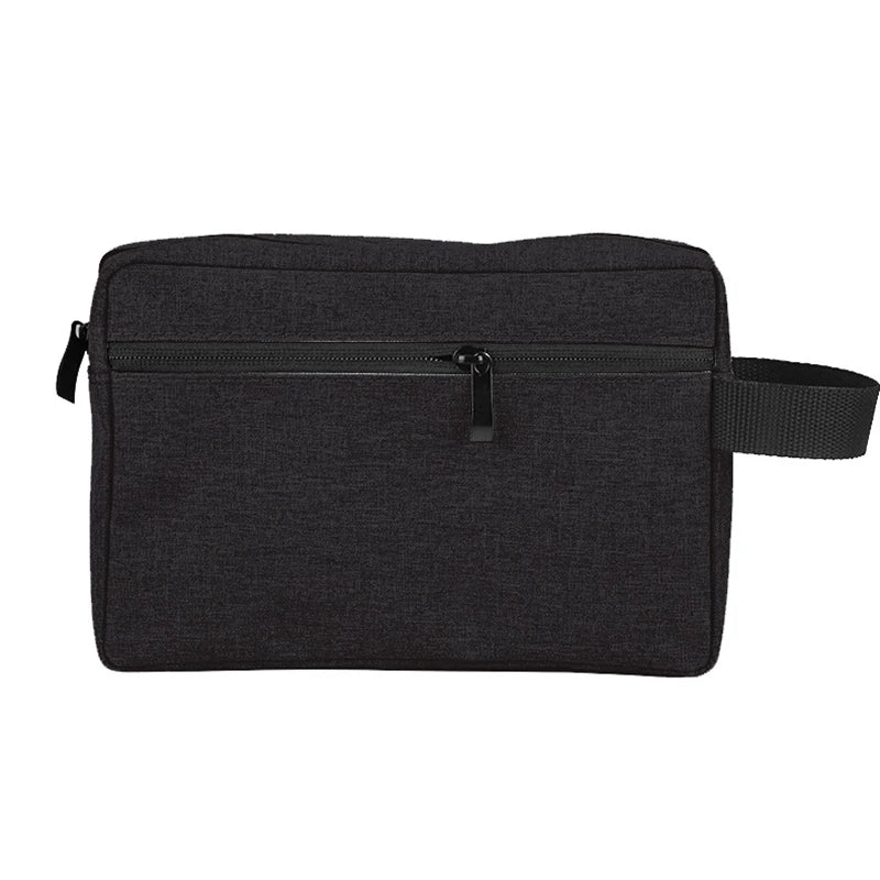 A black waterproof travel toiletry bag with a zippered compartment and an adjustable strap.