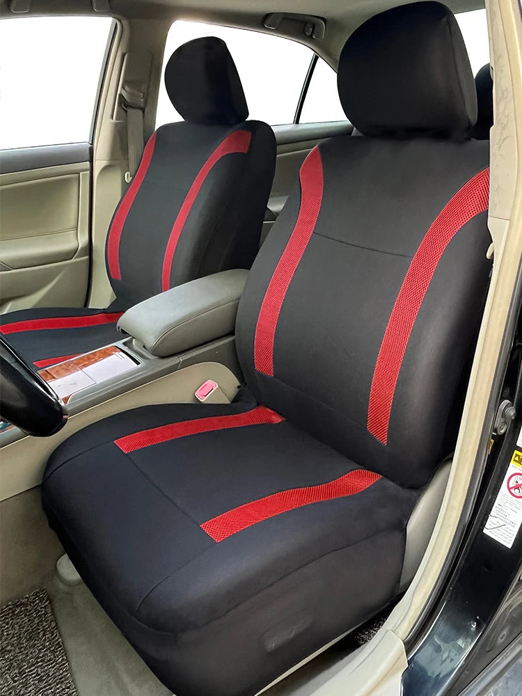 A black and red two-tone car seat cover set installed in a vehicle interior.