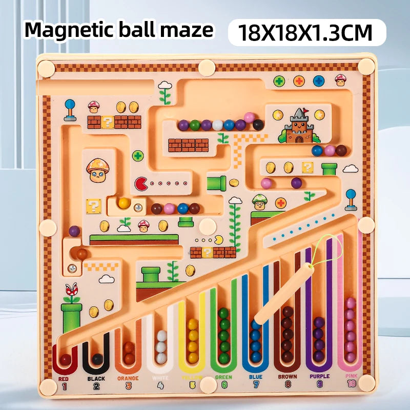 A magnetic ball maze puzzle board with various colored balls and pathways for learning
