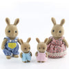 A set of five small, fuzzy animal miniature dolls with soft brown and pink fur, dressed in denim and floral outfits.