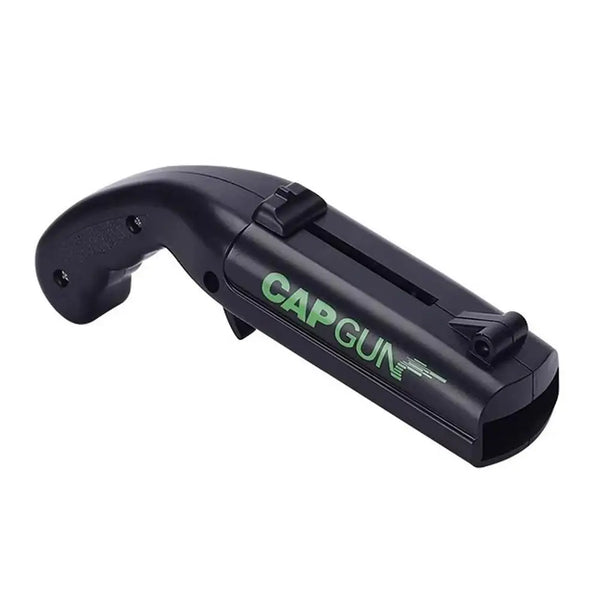 A black cap gun bottle opener tool with a handle and grip.
