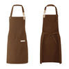 A brown waterproof canvas chef apron with long straps and a tie closure.