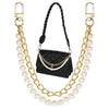 Elegant pearl and gold purse chain featuring a black quilted leather pouch.