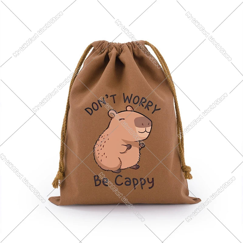 A brown drawstring storage bag featuring a cute capybara illustration on the front.