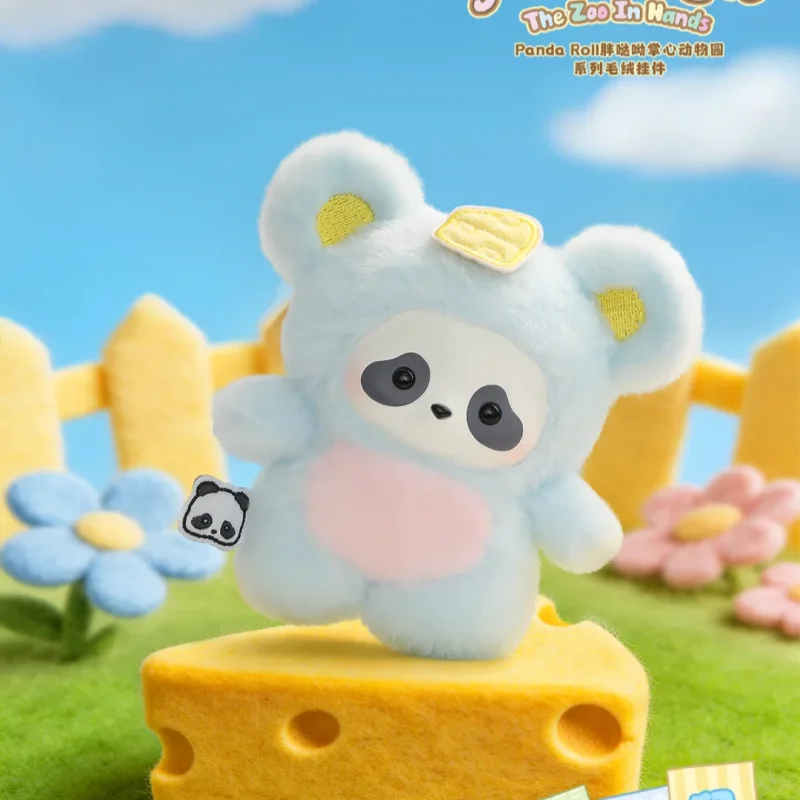 A light blue panda plush toy standing on a yellow platform with green grass and pink flowers.