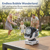 A man and a child are playing with an endless bubble wonderland machine outdoors on a wooden deck.