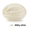 A ball of milky white extra thick chenille yarn for hand knitting