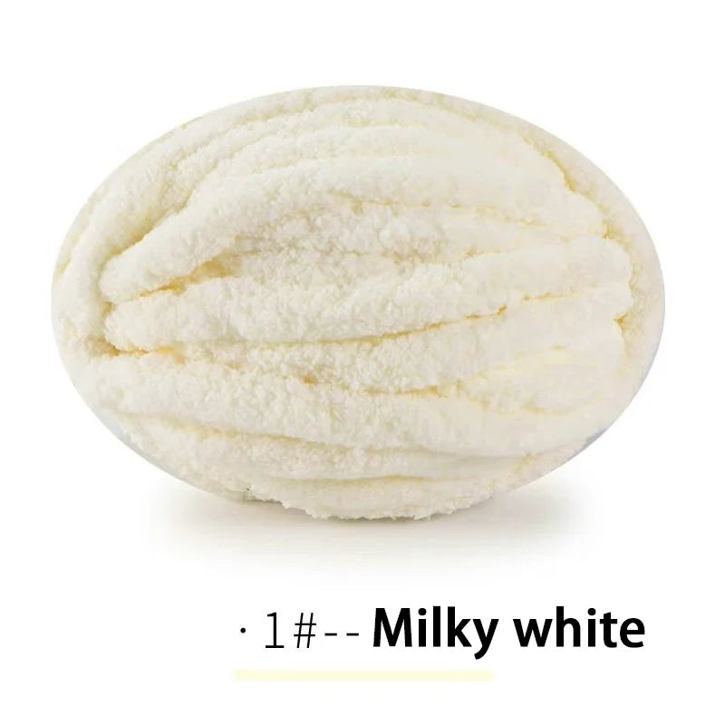 A ball of milky white extra thick chenille yarn for hand knitting