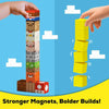 Hands are building a tall tower of colorful magnetic blocks, demonstrating stronger magnets for bold builds.