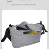 Gray organizer bag for strollers featuring a lengthened hook and loop for secure attachment.