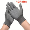 A pair of gray knitted anti-slip work gloves with a dotted grip shown on a person's hand and wrist.
