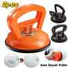 Orange heavy duty car dent puller kit with two suction cups and a handle for auto repair.