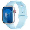 A light blue silicone sport band for an Apple Watch displayed on a white background.