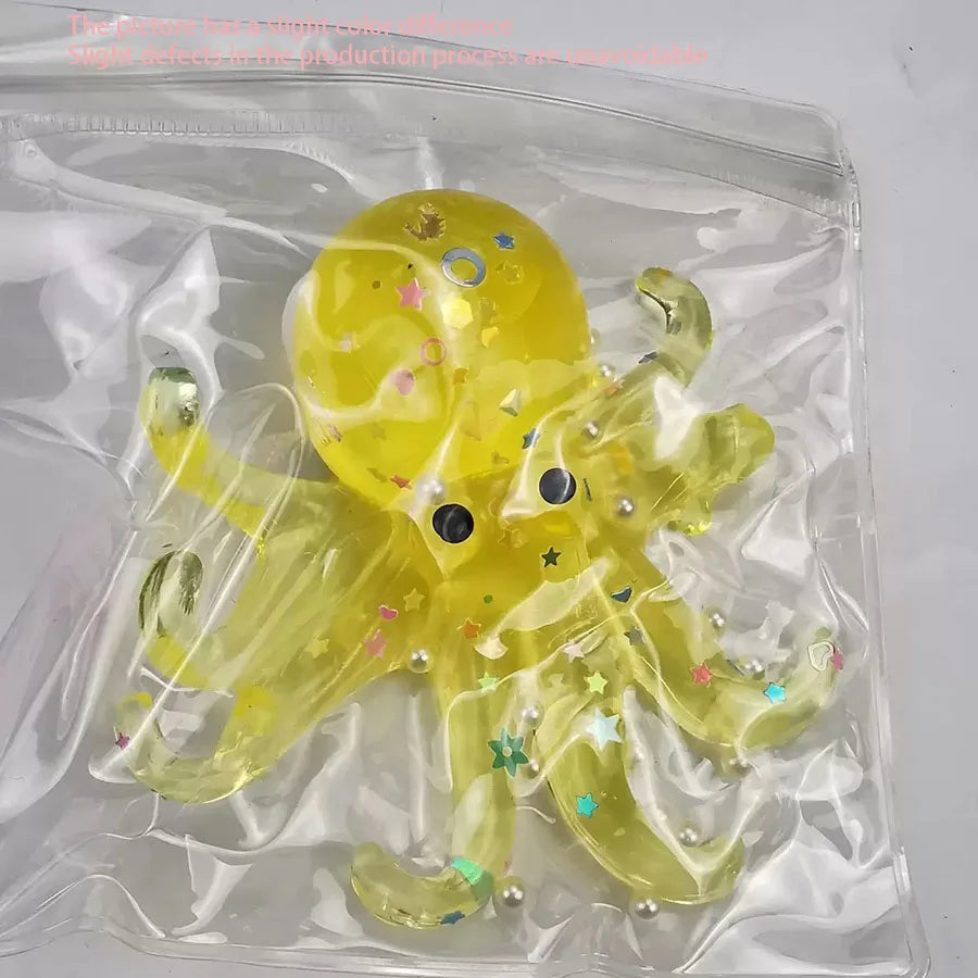 A yellow ocean octopus squishy toy is visible inside a clear plastic bag.
