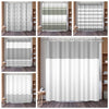 A collection of shower curtains featuring various geometric stripe patterns and waffle weaves in shades of gray and white.