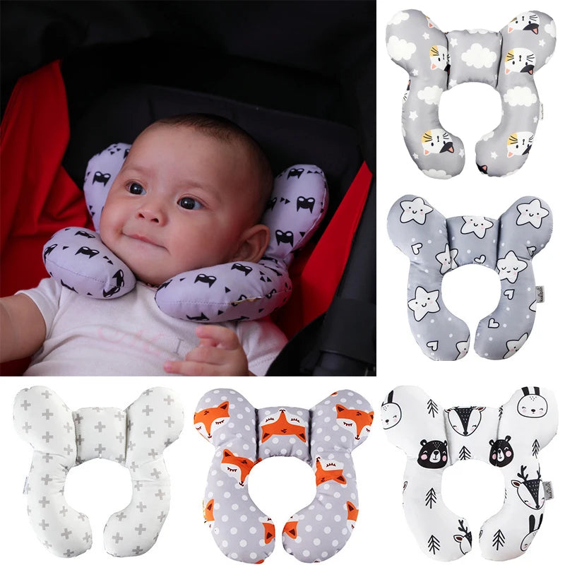 A set of soft, padded head and neck support pillows for a baby, shown in various colors and patterns.
