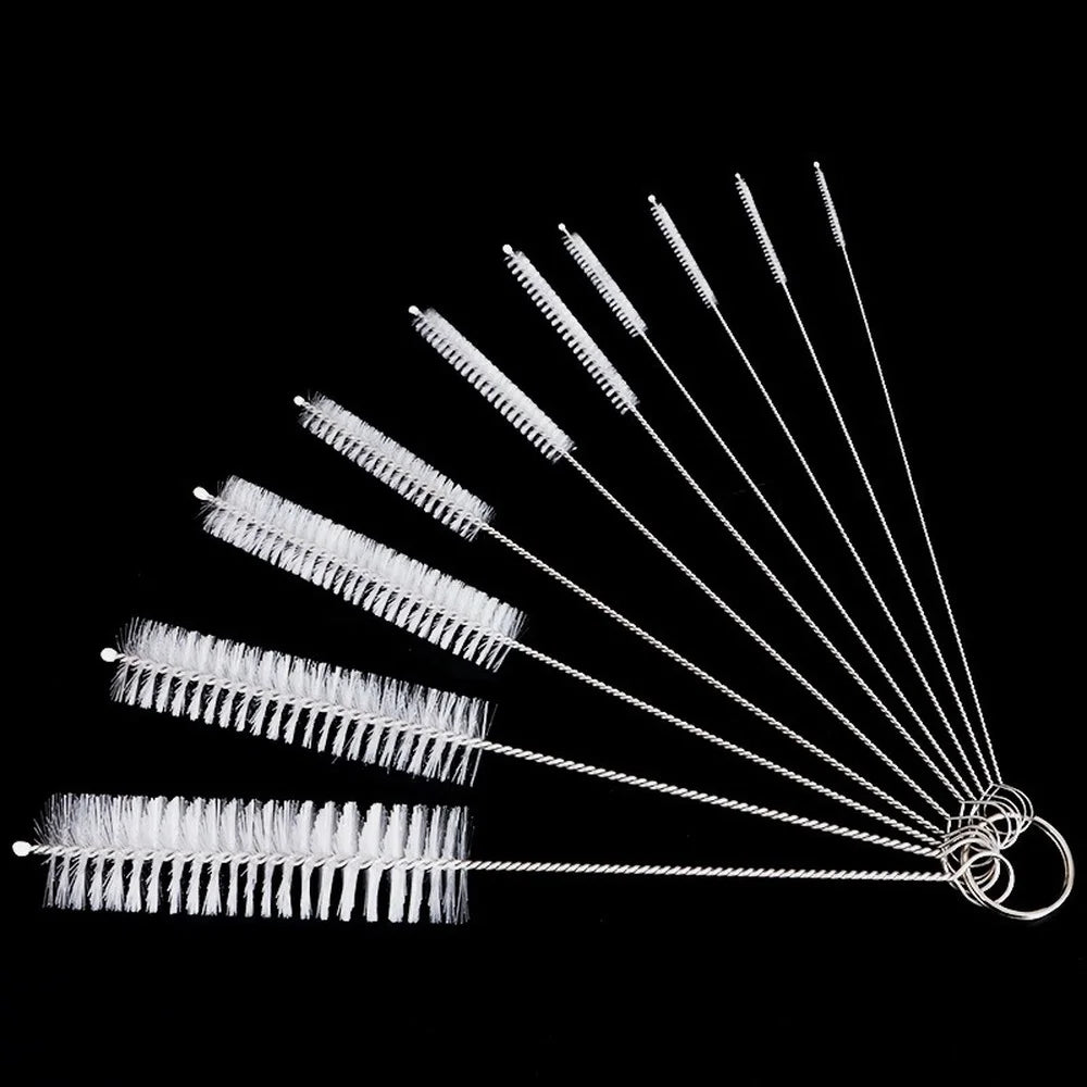 A set of ten nylon bottle and straw cleaning brushes extending outwards against a black background.